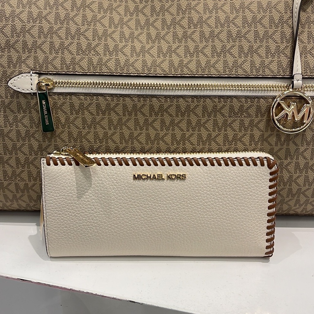 Michael Kors Jet Set Travel Large Pebble Leather Quarter-Zip Wallet
NWT
